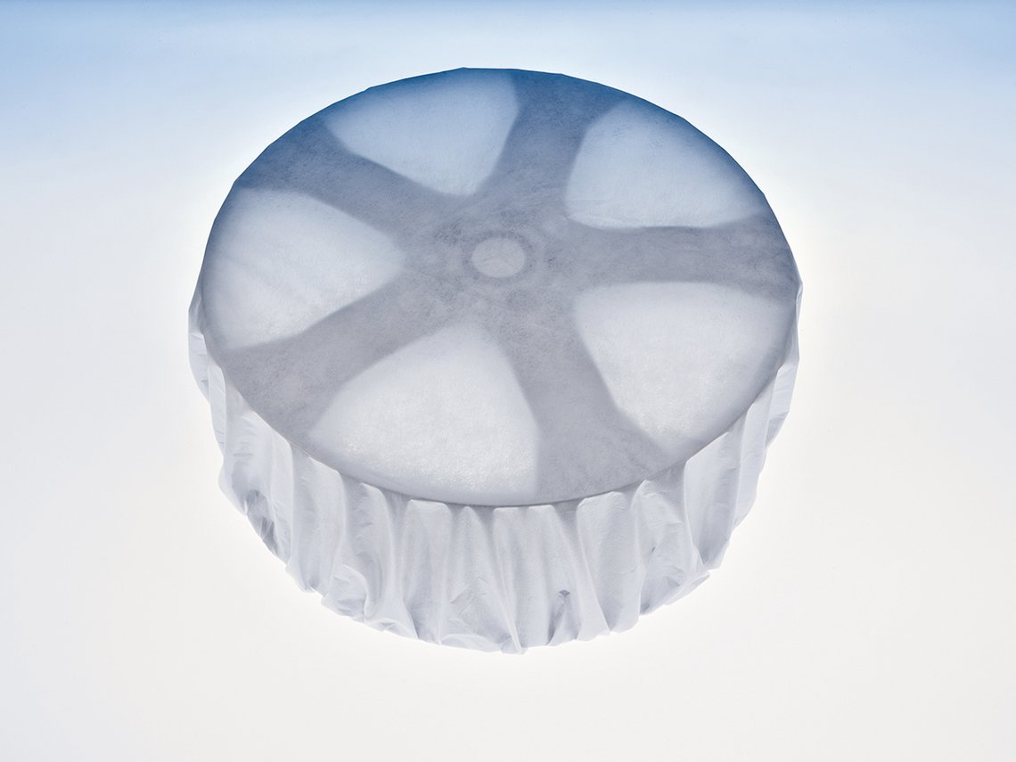 Wheel with white FleeceGuard protective cover